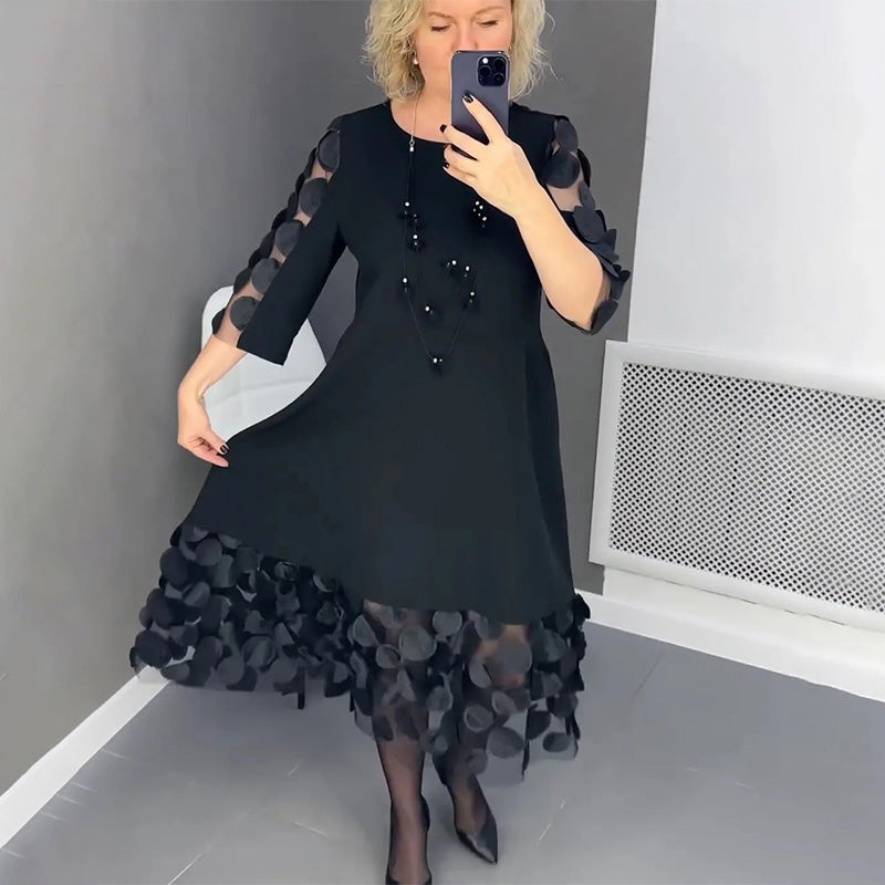 Elenora | Elegante zwarte midi- jurk  met stippen