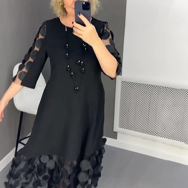 Elenora | Elegante zwarte midi- jurk  met stippen
